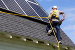All Energy Solar Installer on Roof